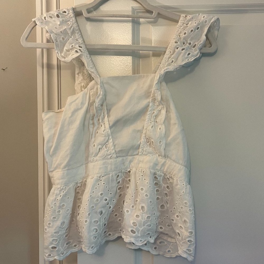 White peplum top
